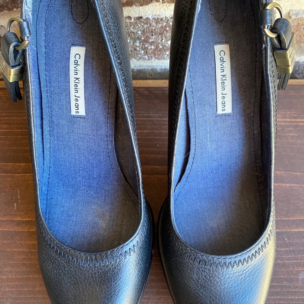 Calvin Klein black leather platform heels